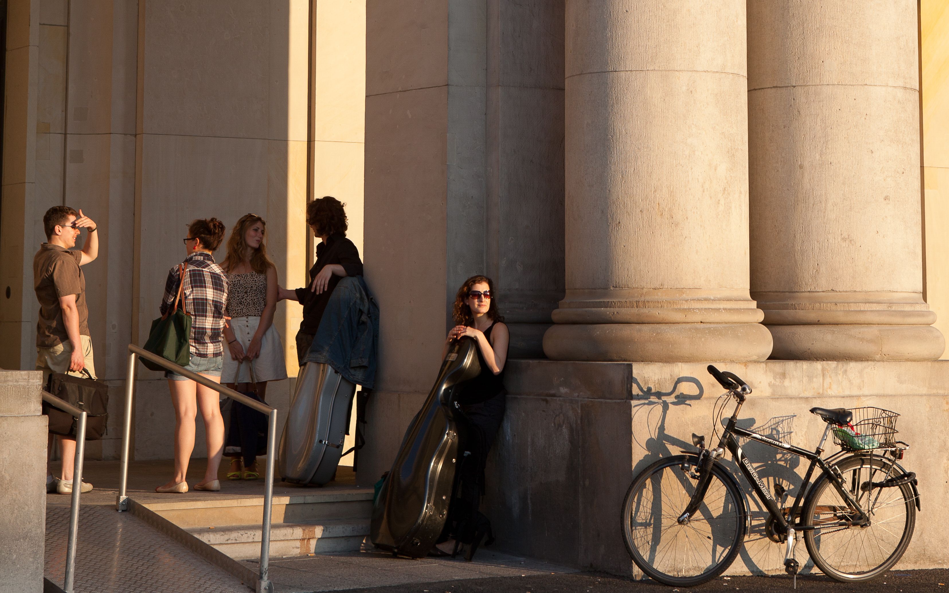 Students chatting in front of the school building
